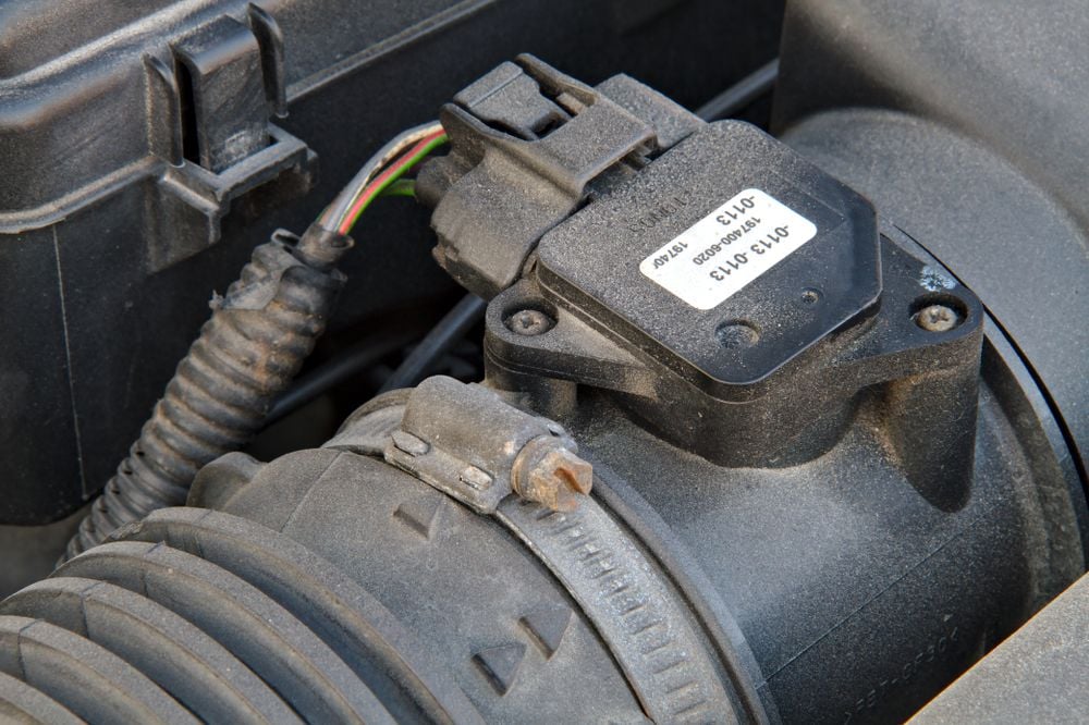 A faulty mass airflow sensor could cause a backfire.